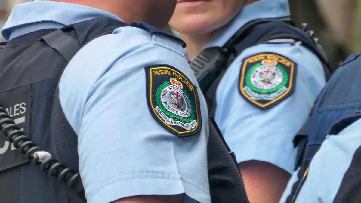 Falsche Wahrsagerin in Australien verhaftet Symbolbild: Polizei mit Uniformen der New South Wales Police Force in Australien