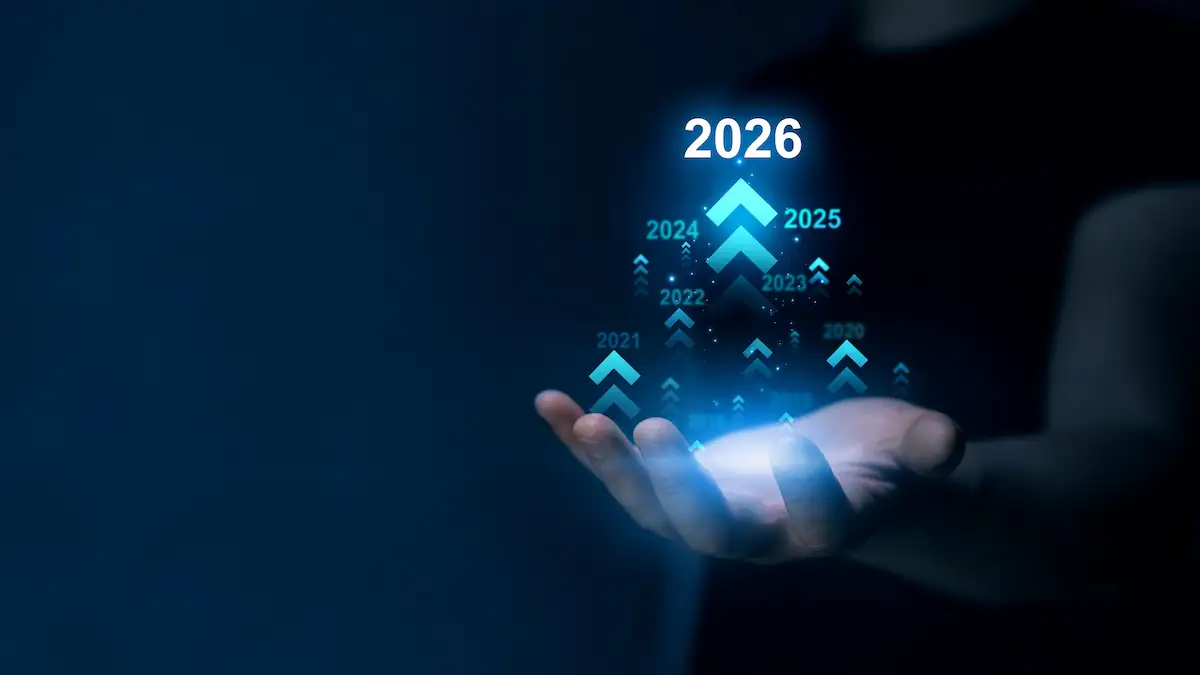 ChatGPT Prognosen 2026: Über einer Hand schwebt eine Projektion der Zahl 2026
