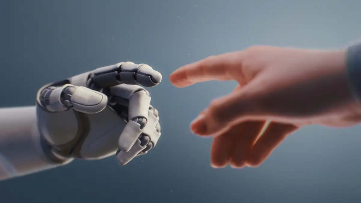 Jobverlust durch KI: Roboterhand und menschliche Hand nähern sich