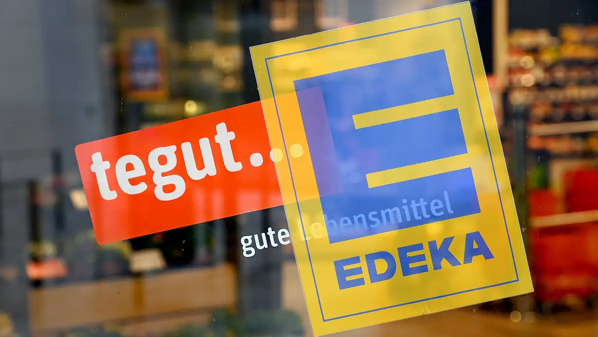 Fotomontage zeigt die Logos der beiden Supermärkte Tegut und Edeka